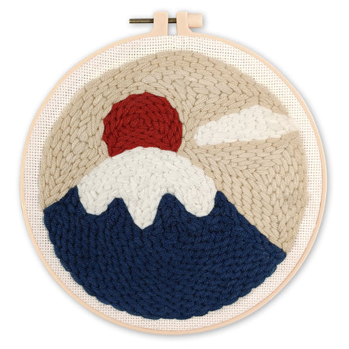 Punch Needle Sommet enneigé et pompon rouge