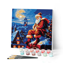 Charger l'image dans la galerie, Mini Peinture par Numéros 20x20cm avec cadre Père Noël sur les toits