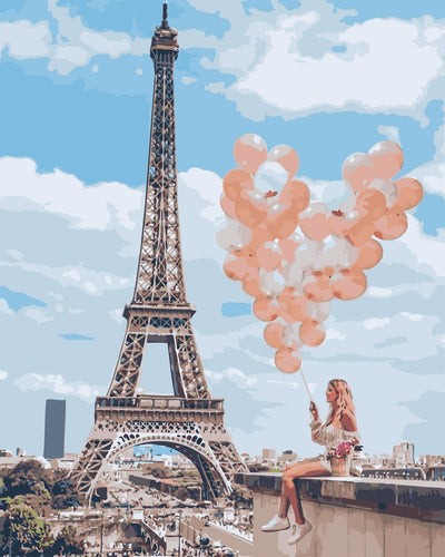 Femme et ballons au bord de la Tour Eiffel
